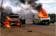 An ambulance and police vehicle were among three vehicles set alight by community members in Boikhutso on Tuesday. 