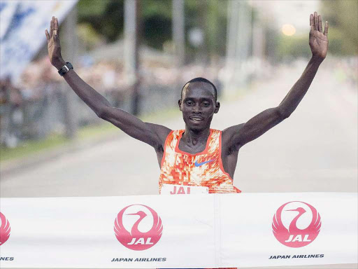 Kenya’s Lawrence Cherono crosses the finish line to win Amsterdam last year /COURTESY
