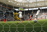 Marie-Laure Delie of France (2nd R) scores a goal against Nigeria during their Women's World Cup Group A soccer match in Sinsheim June 26, 2011