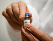 A nurse prepares Russia's Sputnik-V coronavirus vaccine for inoculation at a clinic in Tver. 