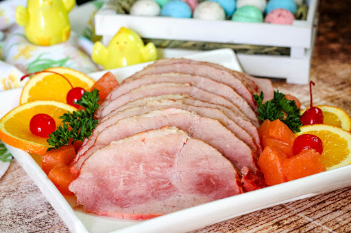 Slices of Easter Ham on a platter.