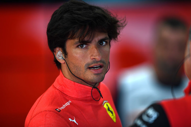 Carlos Sainz in the garage during practice ahead of the F1 Grand Prix of Belgium at Circuit de Spa-Francorchamps on August 26, 2022 in Spa, Belgium.