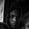 Woman at doorway 1991<br />
foto: © Shahidul Alam