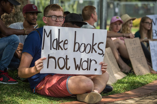 Students from University of Pretoria having a silent protest outside the Campus.