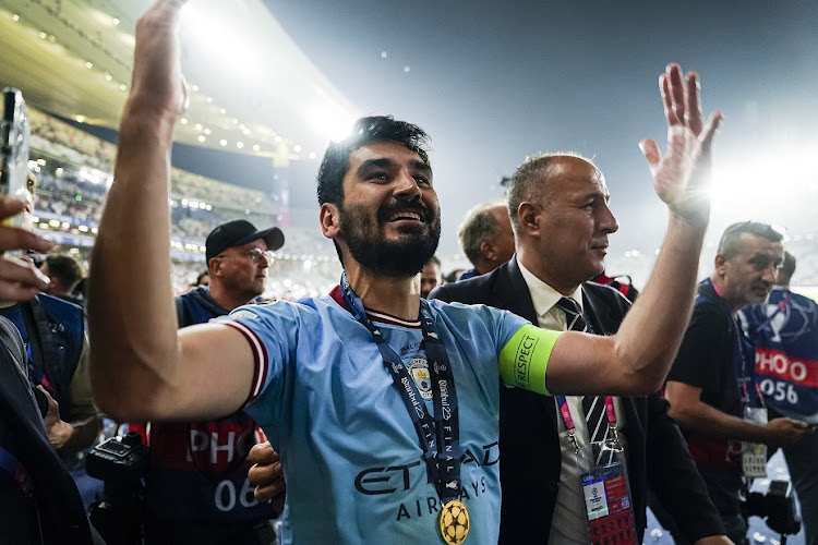 Manchester City captain Ilkay Gundogan celebrates with his teammates after winning the Uefa Champions League final against Inter Milan at Atatuerk Olympic Stadium in Istanbul, Turkey on June 10 2023.