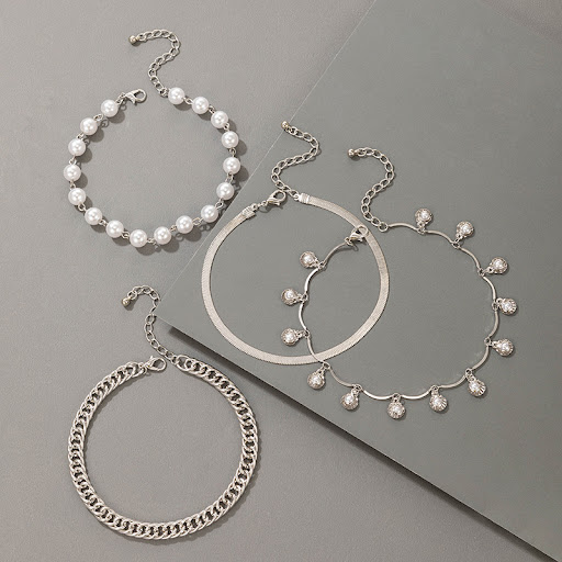 Title 2, Fashion Pearl Beaded Four Layer Anklet. Elevate...