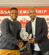 Coach Tebogo Moloi of Chippa United receives his award during the Absa Premiership Player and Coach (Nov) and Goal (Oct) of the Month Announcement at PSL Offices on December 11, 2017 in Johannesburg. 
