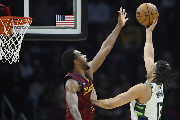 Cleveland Cavaliers center Evan Mobley (4) blocks a shot attempt by Milwaukee Bucks forward Jordan Nwora (13) in recent match