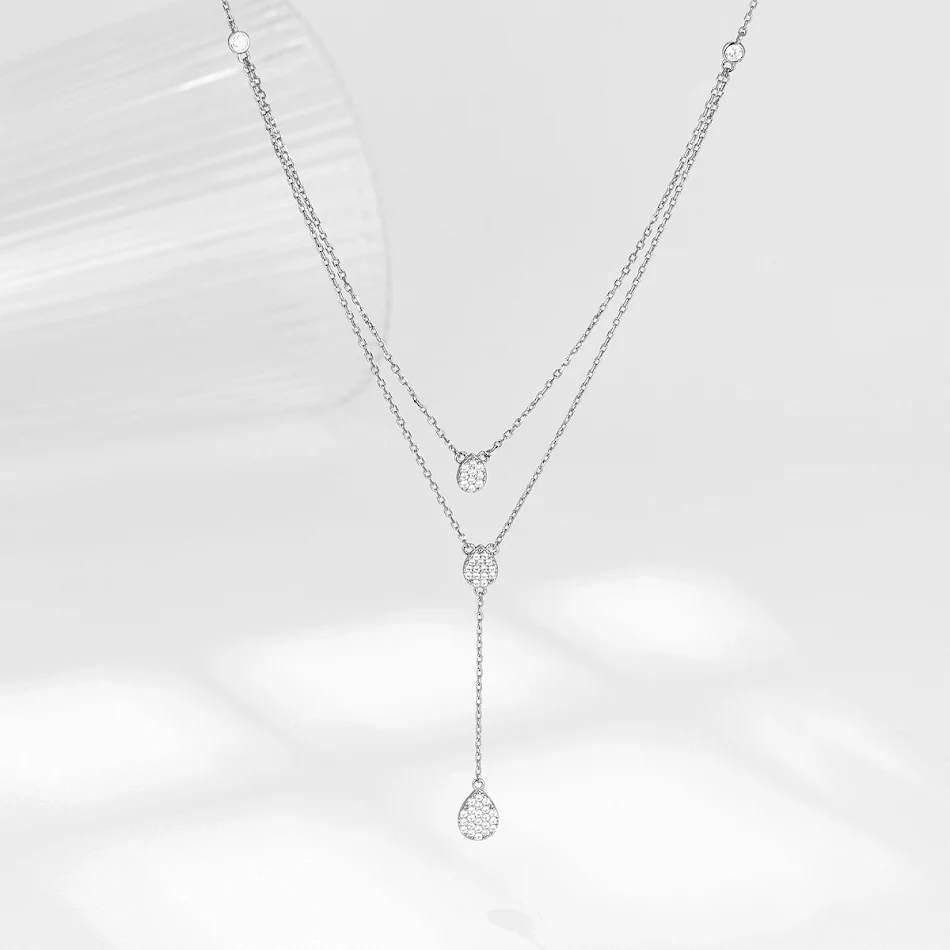 Collier double couche pour femme en argent 925, simple et élégant, avec diamant goutte d'eau. Un bijou de haute qualité pour sublimer votre clavicule.