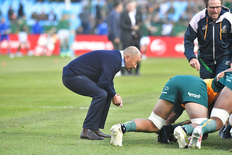 Wallabies coach Eddie Jones called a reporter a "smart a*se" after Saturday's Test at Loftus. Here he is casting an eye during the pre-match warm-up.