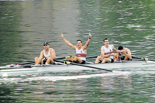 TEAM BROTHER: The victorious Brittain crew after crossing the finish line in the Grand Challenge final at the Buffalo Regatta on Saturday Picture: WILL GRANZIER