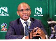 Premier Soccer League (PSL) spokesperson Lux September speaks during a press conference at the Moses Mabhida Stadium on March 08, 2017 in Durban, South Africa.