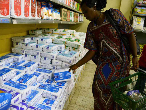 A customer shopping for Unga group ltd products at a supermarket in Nairobi.