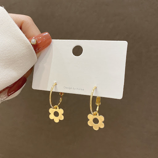 Title 2, Flower earrings with contrast spray paint, smal...