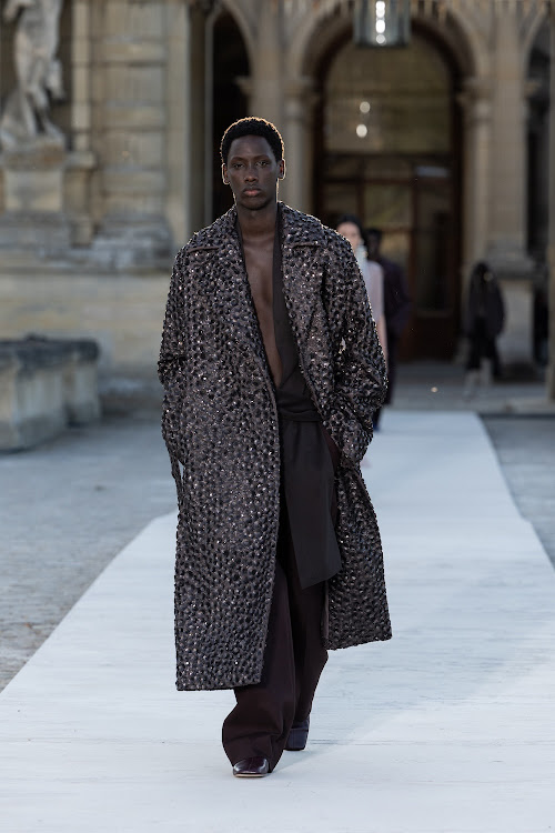 Model walks the Valentino Haute Couture runway.