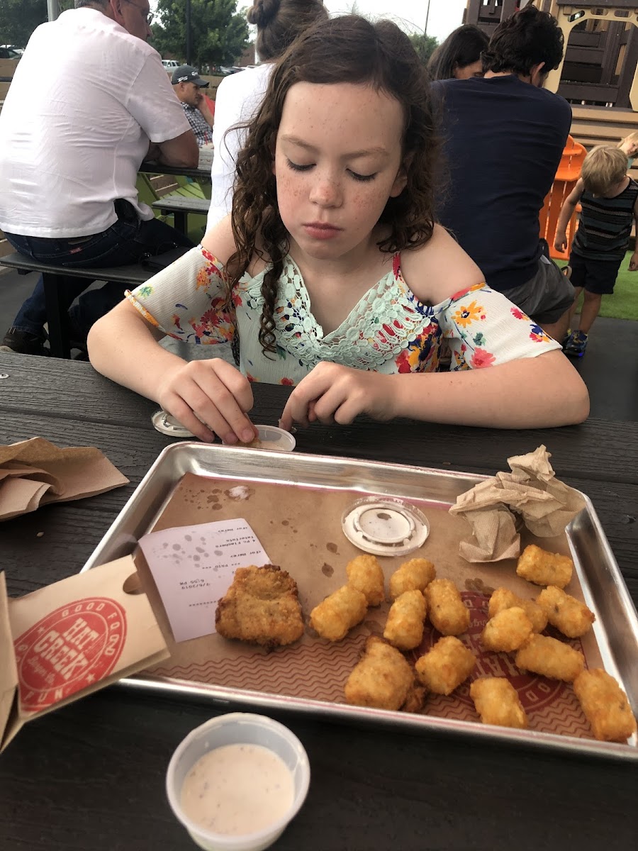 Enjoying our celiac friendly chicken flashers and tater tots!  Ranch was awesome!