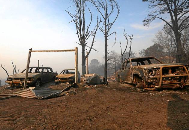 DEVASTATION ROAD: Burnt-out cars on Paradise Road in Knysna