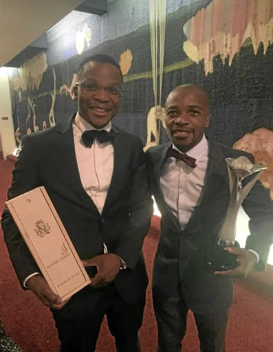 SA Sportsman of the Year award winner IBF flyweight champ Moruti Mthalane, right, with BSA CEO Tsholofelo Lejaka.