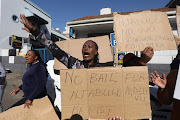 Angry Sobantu township residents picketed outside the Pietermaritzburg magistrate's court on Wednesday, where a triple-murder suspect was meant to make an appearance. The community also stormed Mountain Rise police station to find out when the suspect would appear after his no show. 