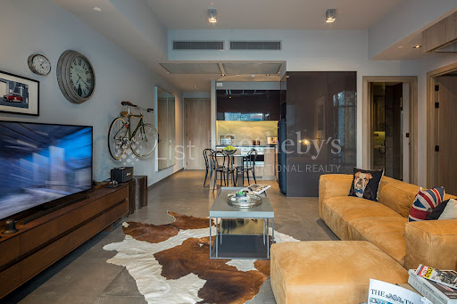 Modern living room, ochre sofa, open kitchen - Luxury apartment / penthouse for sale in Watthana, 1 bedroom
