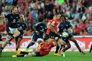 Rabs Maxwane (R) of Bulls is tackled by Harold Vorster of Lions during the Super Rugby match between Lions and Bulls on 20 May 2017 at Emirates Airline Park Stadium. Sydney Mahlangu /BackpagePix