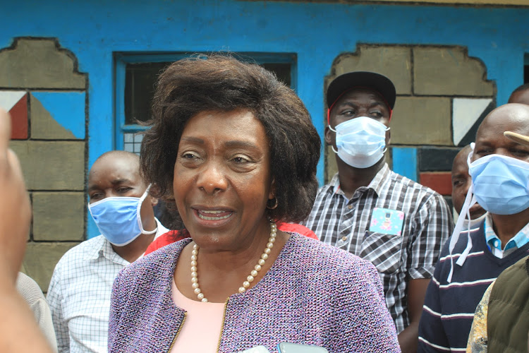 Governor Ngilu addressing media at the house where four died following fire tragedy