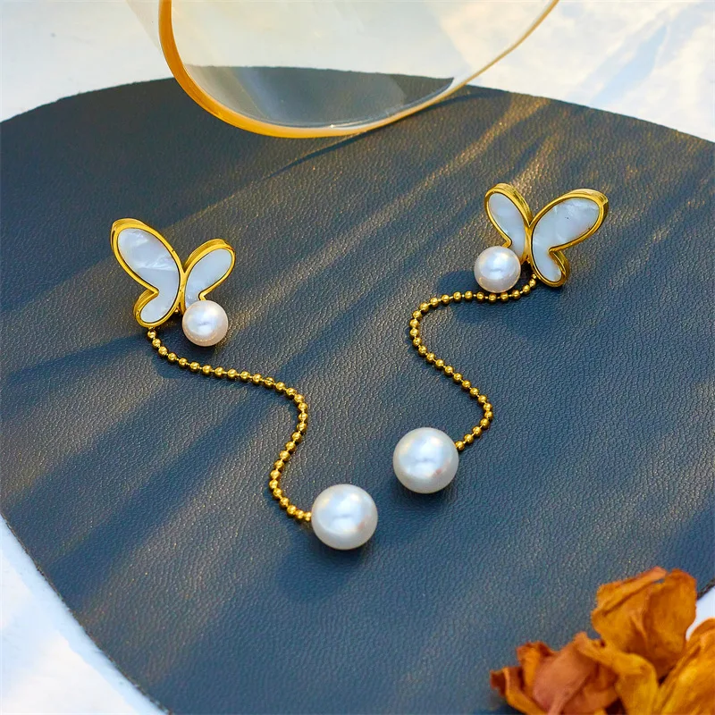 Aretes de moda con borlas de mariposa asimétricas, perfectos para cualquier ocasión, elegantes y versátiles para lucir radiante.