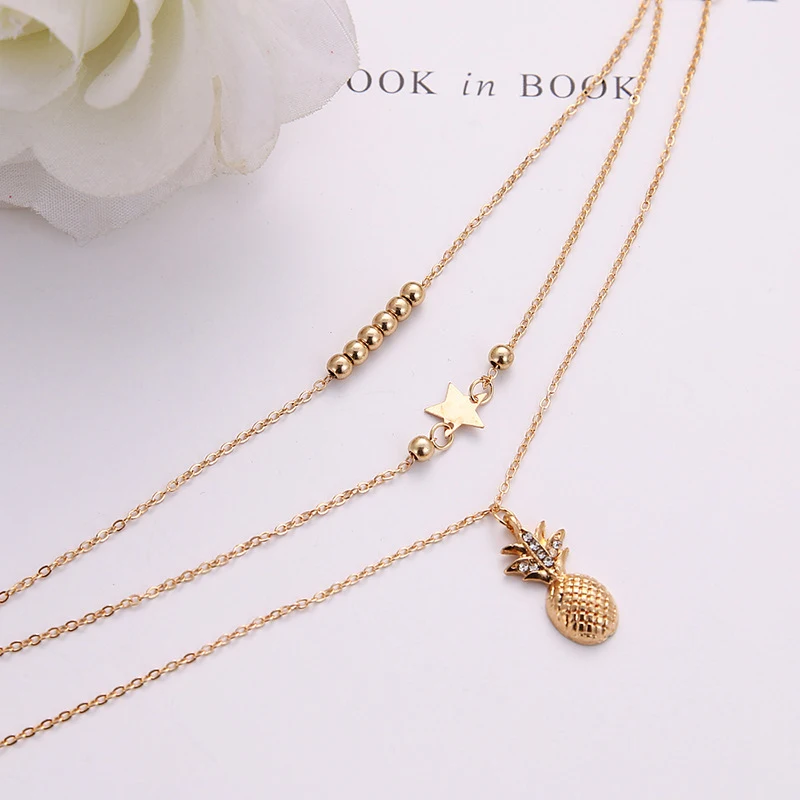 Bracelet de cheville deux pièces de plage pour femmes avec pendentif ananas en strass et perles rondes XINGX, tendance et élégant.