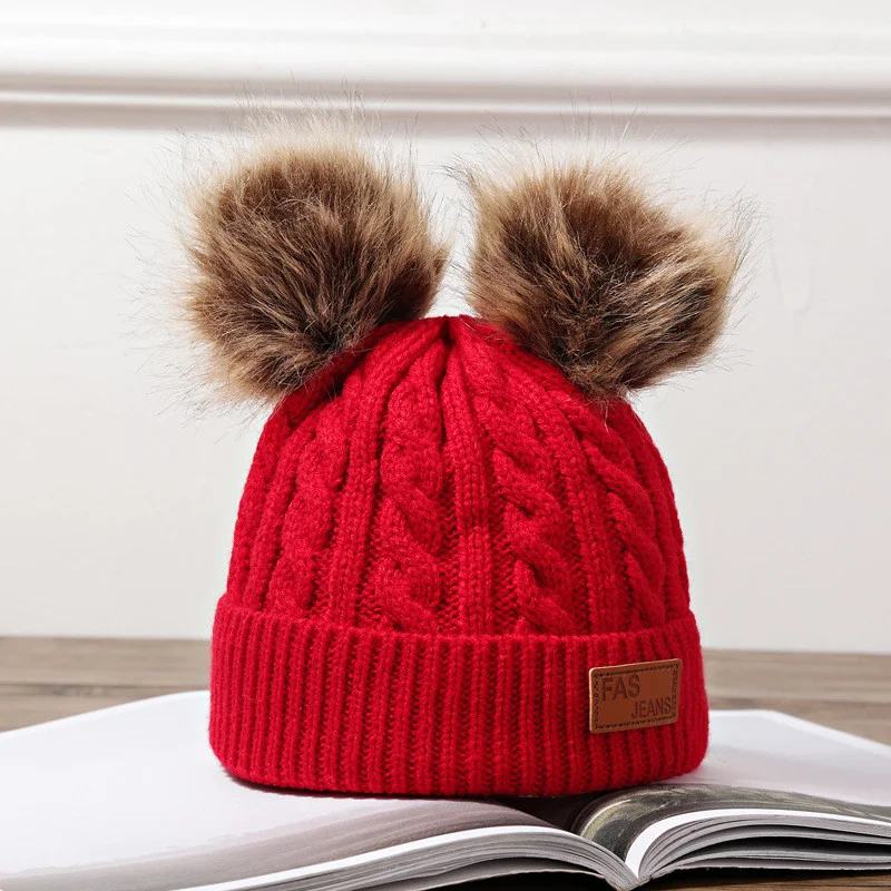 Gorros de bebé con orejeras y gorros infantiles de piel de mapache para mantener a los pequeños abrigados y cómodos durante el invierno.