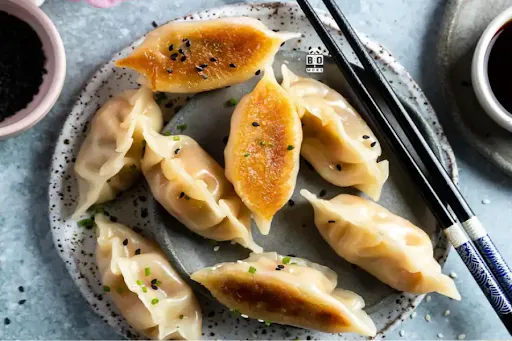 Veg With Burnt Garlic Gyoza