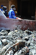 The March 2012 MSF cleaning campaign with residents of an unlawfully occupied building.