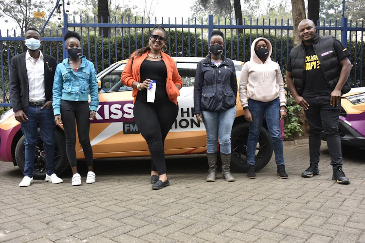 Kamene and Jalas with the Kisses of Kindness Naivas shopping voucher winners