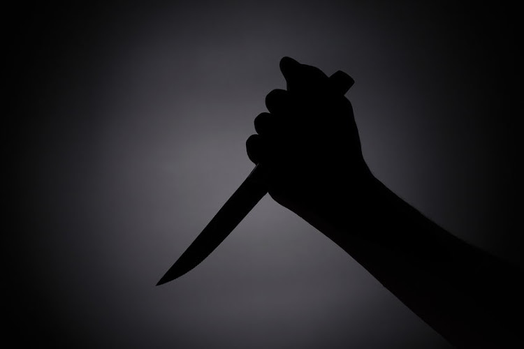 Unknown suspects threatened the victim with a knife and screwdriver. . Stock photo.