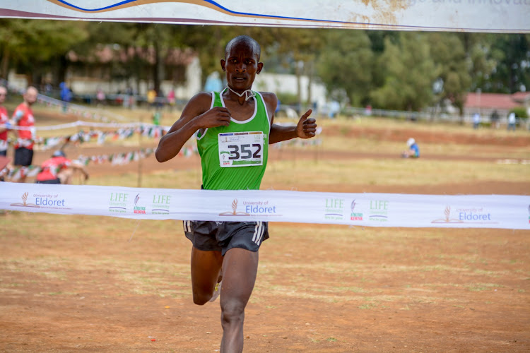 Mathew Kipkosgey cuts the tape to win 6km junior men at the Eldoret Cross Country over the weekend. He will be leading compatriots at St Francis Kimuron at the Africa under 20/18 trials this weekend at the Nyayo stadium.