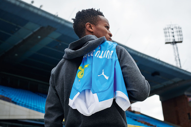 Mamelodi Sundowns playmaker Themba Zwane parades the club's new away kit which resembles the colours of their neighbours, the Vodacom Bulls, during a ceremony at Loftus Versfeld Stadium in Pretoria on Wednesday August 1 2018.