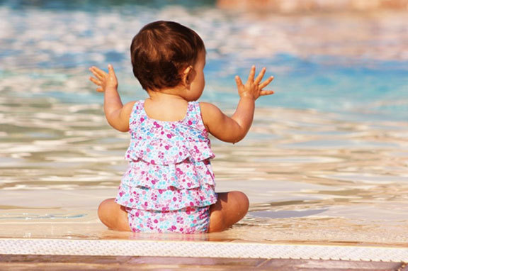 A toddler enjoying a water park in Orlando