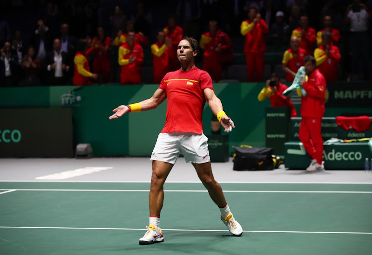 Rafael Nadal of Spain celebrates following victory in the match against Karen Khachanov of Russia during day 2 of the Davis Cup at La Caja Magica on November 19, 2019 in Madrid, Spain.