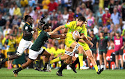 Lachlan Anderson of Australia breaks away from the defence in the MenÃ•s final match against South Africa during day three of the 2018 Sydney Sevens at Allianz Stadium on January 28, 2018 in Sydney, Australia.  