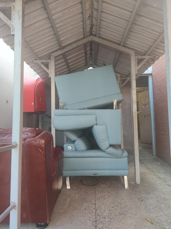 The famously looted blue San Pablo corner sofa has been recovered by the police.