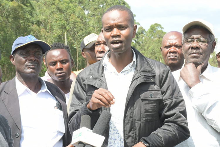 West Mugirango NG-CDF coordinator Dennis Kirwa addresses journalists at Riakimai in West Mugirango constituency during a public participation on the establishment of Nyamira university on Tuesday, January, 3.