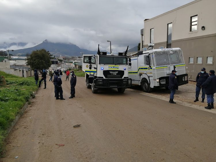 Police in Kayamandi prepare for clashes with Jozi2Stellenbosch protesters on August 12 2020.