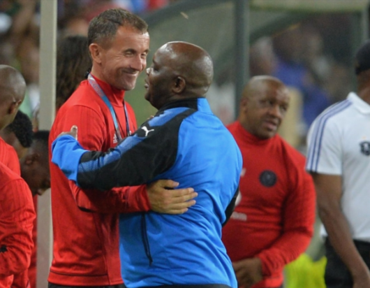 Orlando Pirates coach Milutin "Micho" Sredojevic shares a light moment with his Mamelodi Sundowns counterpart Pitso Mosimane.