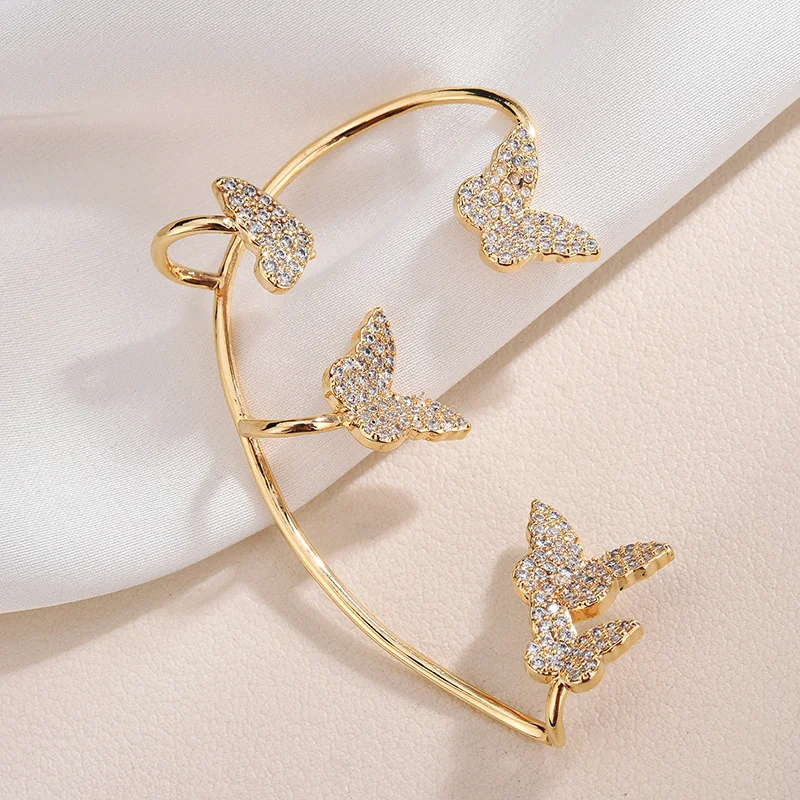 Pendientes de clip de mariposa dorados sin perforación para mujer, circonitas brillantes. Joyas elegantes, regalo ideal.