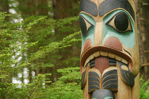 sitka-totem-in-park.jpg - At Sitka National Historic Park, wander through the forest along scenic paths where totems depict the rich culture of the Tlingit people.