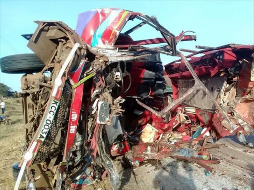 The mangled wreckage of the bus operated by the Nairobi Bus Company in which 36 people died early Sunday after an accident at Migaa along Nakuru-Eldoret highwa. /AMOS KERICH