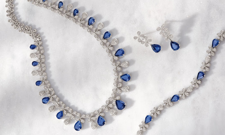 Glorious gems from American Swiss' Masterpieces collection: white gold 1.5ct diamond and natural blue sapphire necklace, R300,000; white gold diamond and natural blue sapphire drop earrings, R60,000; and white gold diamond and natural blue sapphire bracelet, R160,000.