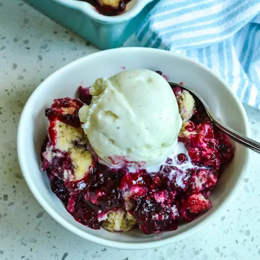 This southern-style cobbler combines lightly sweetened blackberries with a touch of cinnamon and an easy-to-make buttery, flaky biscuit dough.  Serve warm right out of the oven with a scoop of French vanilla ice cream.
