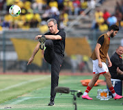 Al Ahly head coach Martin Lasarte kicks the ball in frustration during the 5-0 Caf Champions League first leg quarterfinal defeat away at Mamelodi Sundowns in Pretoria on April 6 2019.  