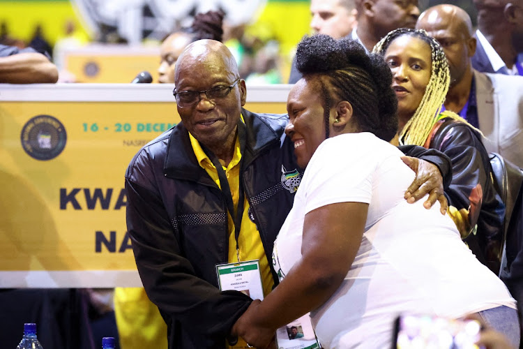 Former president Jacob Zuma greets a delegate at Nasrec, December 16 2022. Picture: SIPHIWE SIBEKO/REUTERS