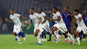 Bafana Bafana players celebrate after winning the penalty shootout in their Africa Cup of Nations quarterfinal agaist Cape Verde at Stade Charles Konan Banny in Yamoussoukro, Ivory Coast on Saturday night.